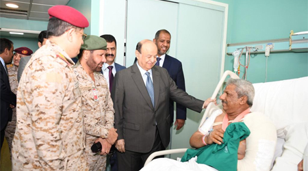 President Hadi visits injured governor of Lahj, Director of Military College