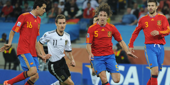 Puyol strikes as Spain down Germany to reach final
