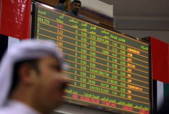 Dubai & Abu Dhabi markets plunge on debt woes