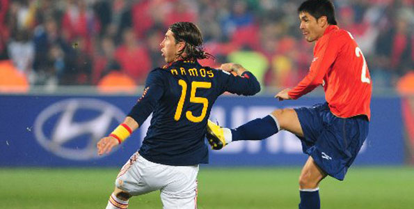 Spain, Chile reach last 16 as Swiss fire blanks