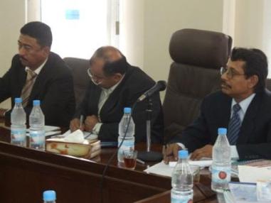  Authority  stands in front of real estate inventory report for gardens and parks